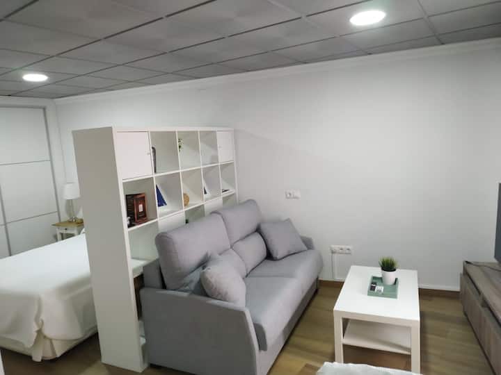 Salón con sofá cama