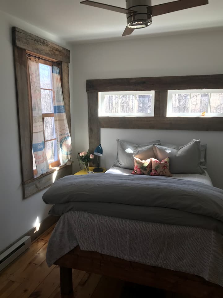 Master Bedroom in the afternoon light-- an organic, latex mattress and OKOtex 100% French Linen sheets, and a feather duvet make for a fabulous night's sleep.