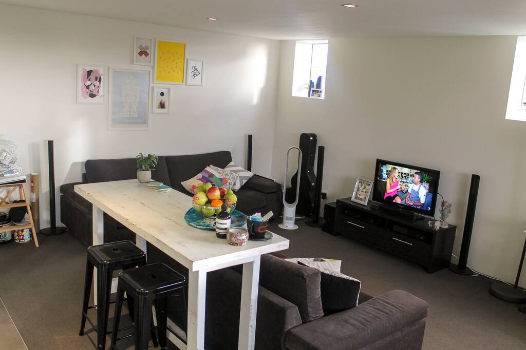 Living room with tv, surround sound system,