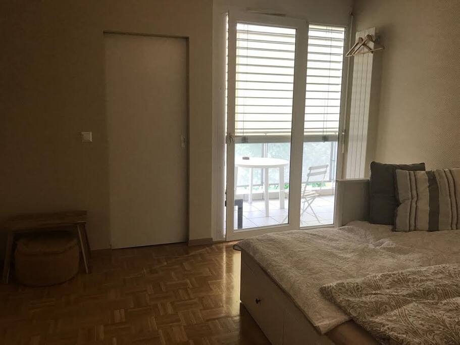 Bedroom with own entrance to the back balcony.
