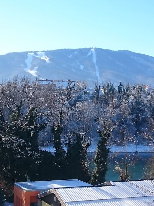 The view from balcony to ski resort Mariborsko Pohorje and river Drava
