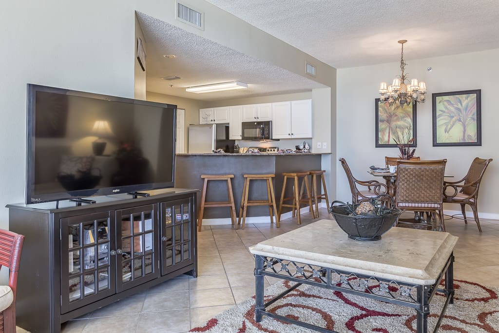 Open layout between the kitchen, living room, and dining room.