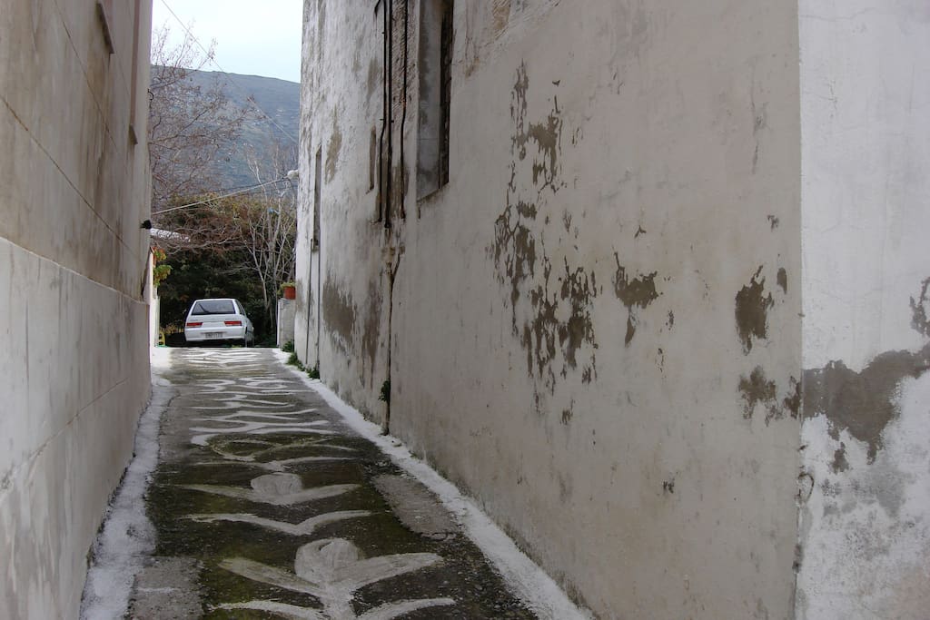 Narrow street leading to the house