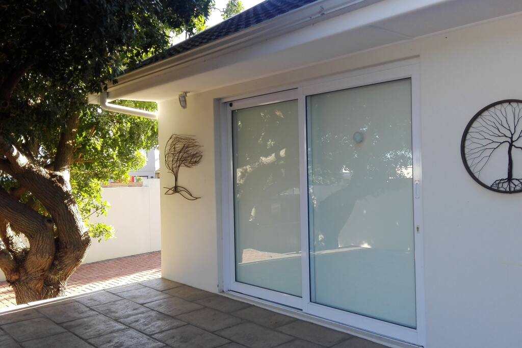 Front outdoor area - Under the Wild Pepper Tree