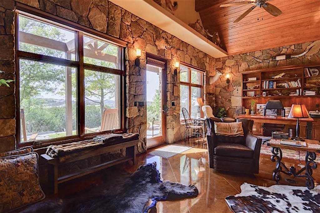 The large windows, polished floors, and incredible views allow guests to relax and enjoy interior and exterior at the same time