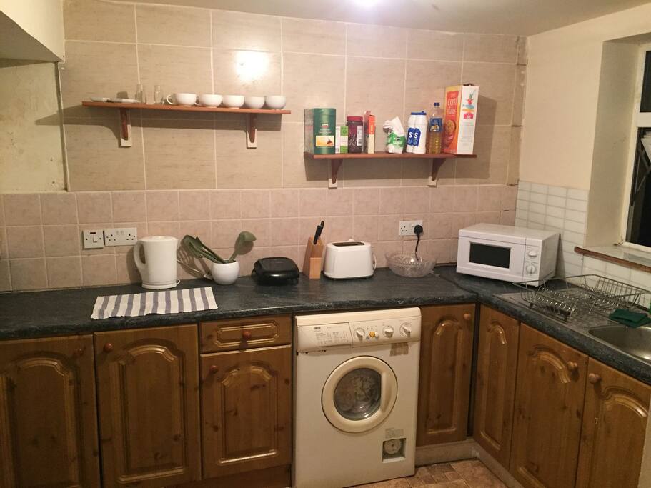 The kitchen area is equipped with all the cooking utensils you will need