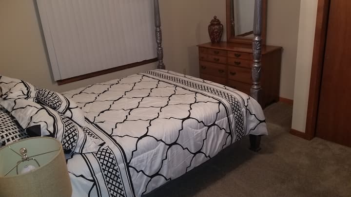 There are two bedrooms off the great room, each with a queen bed and connected by a full bath.