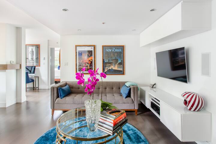 A Luxurious Downtown Urban Oasis with Parking, Awaits You.