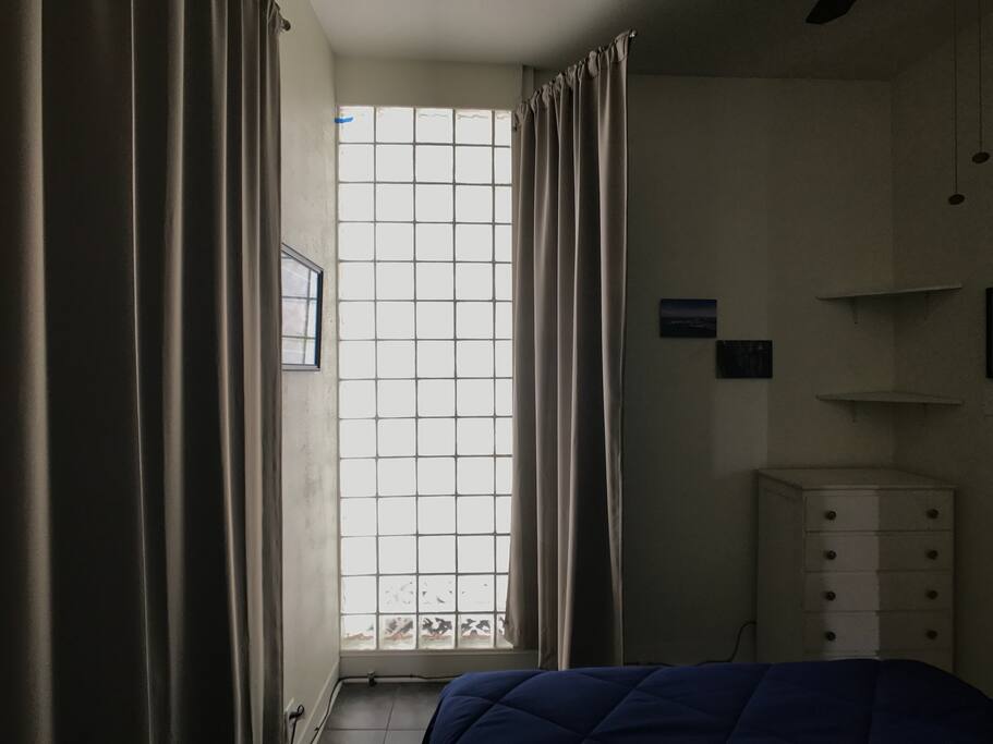 View of the glass block wall inside your room.