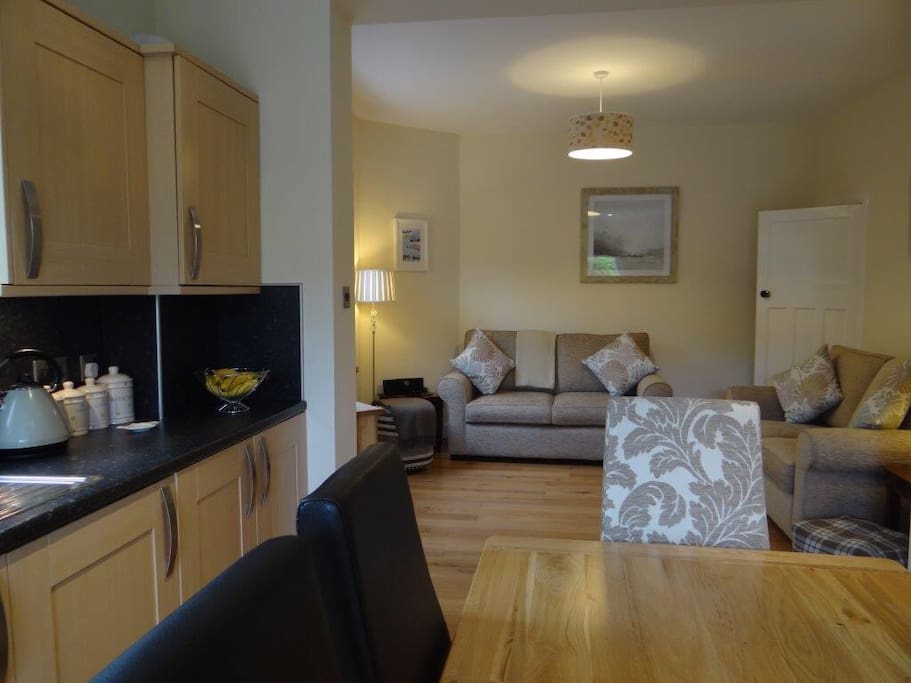 The kitchen/dining/ living area.