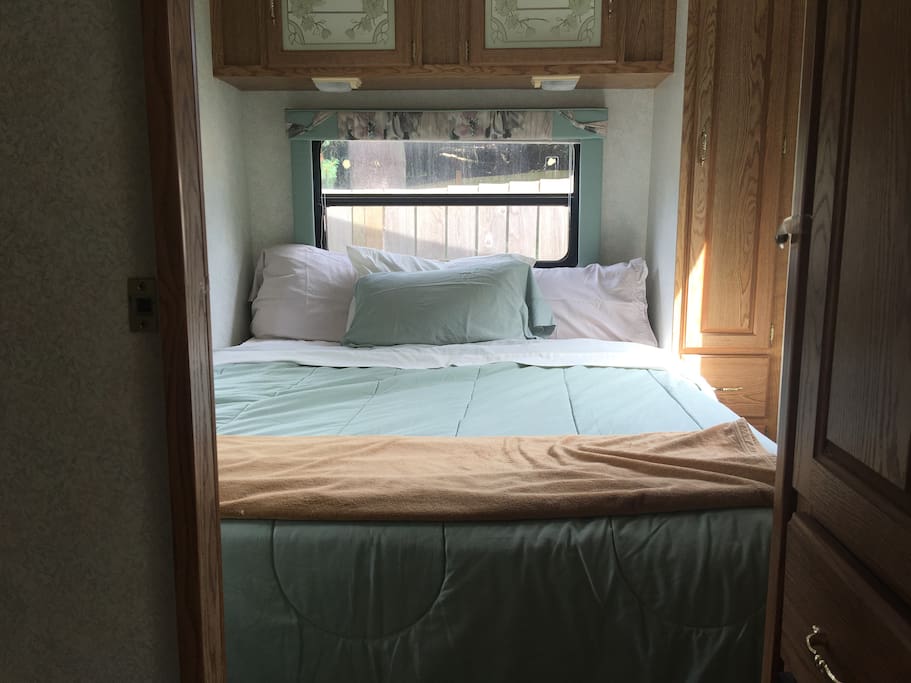 Cozy queen bed with foam topper