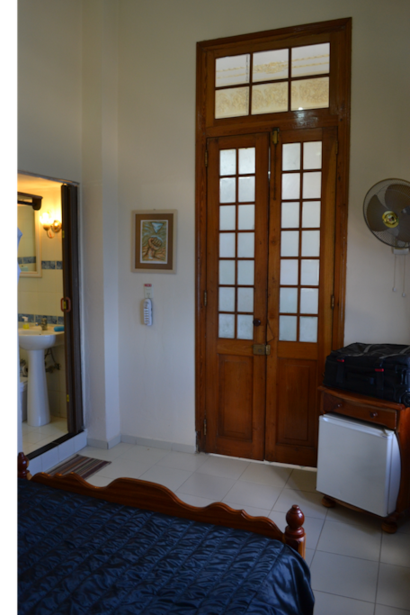 Room with adjacent bathroom