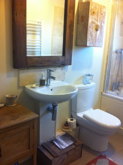 bathroom next to blue bedroom