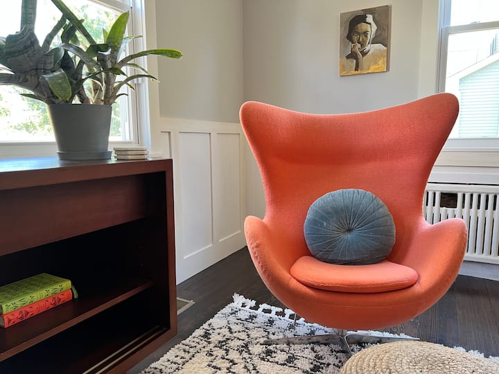 It’s actually comfortable! A chic vintage  mid century modern piece freshens and provides contrast to the 120+ year-old farmhouse vibe. 