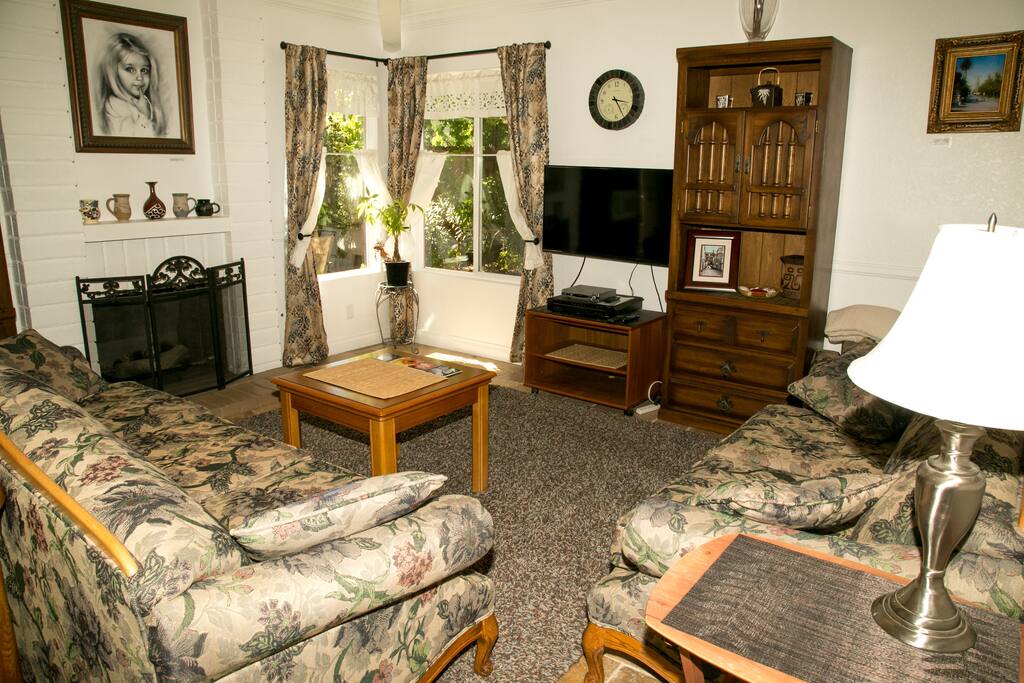 Living Room with Fireplace and TV