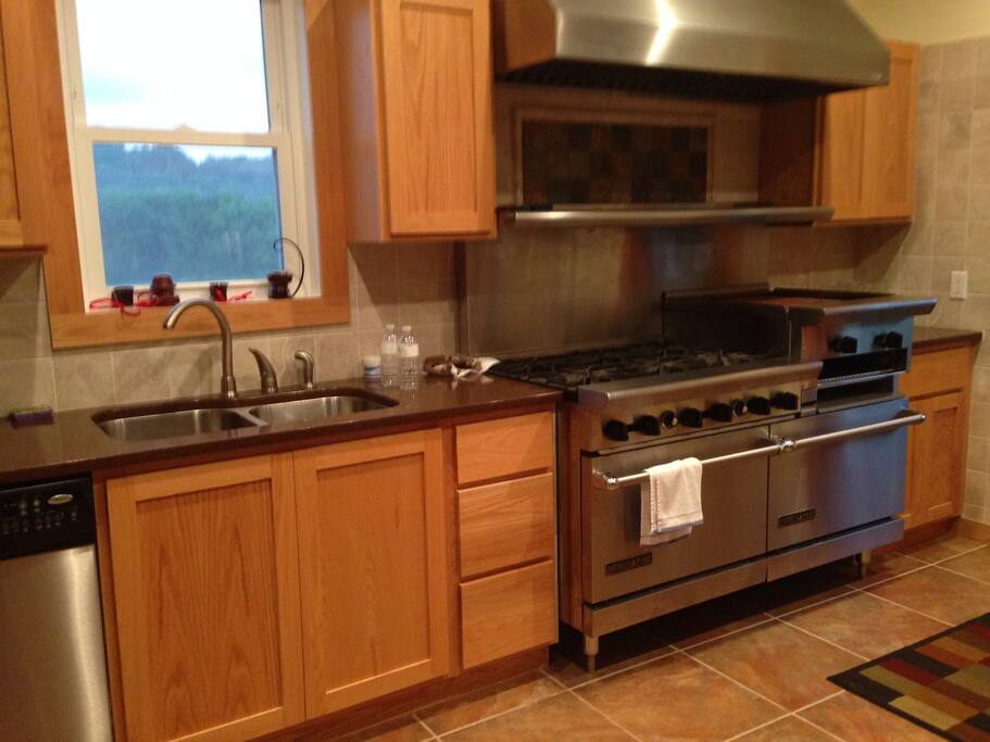 One side of the kitchen with large range