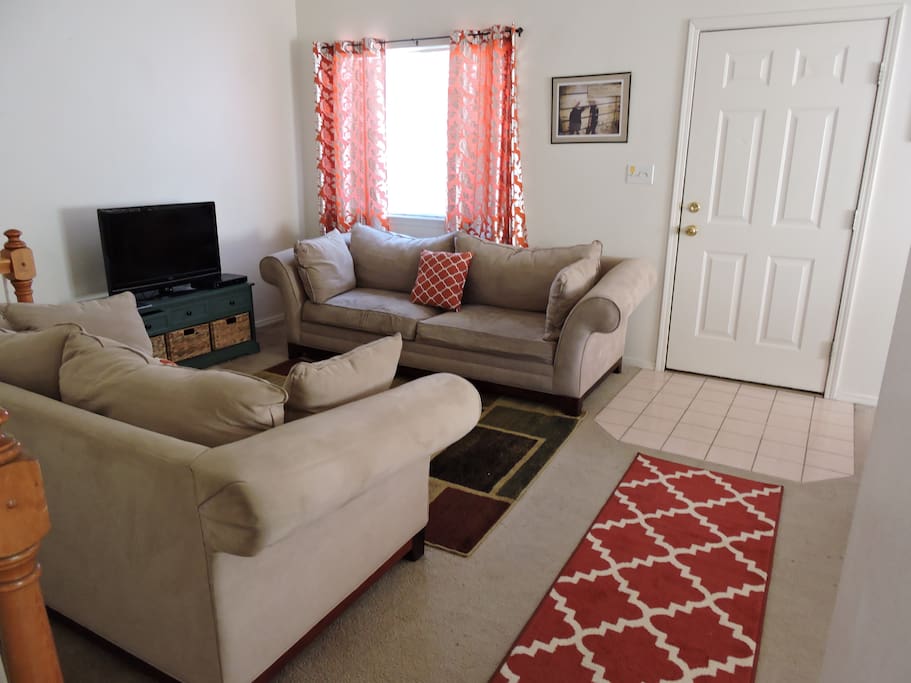 Cozy livingroom area with large TV