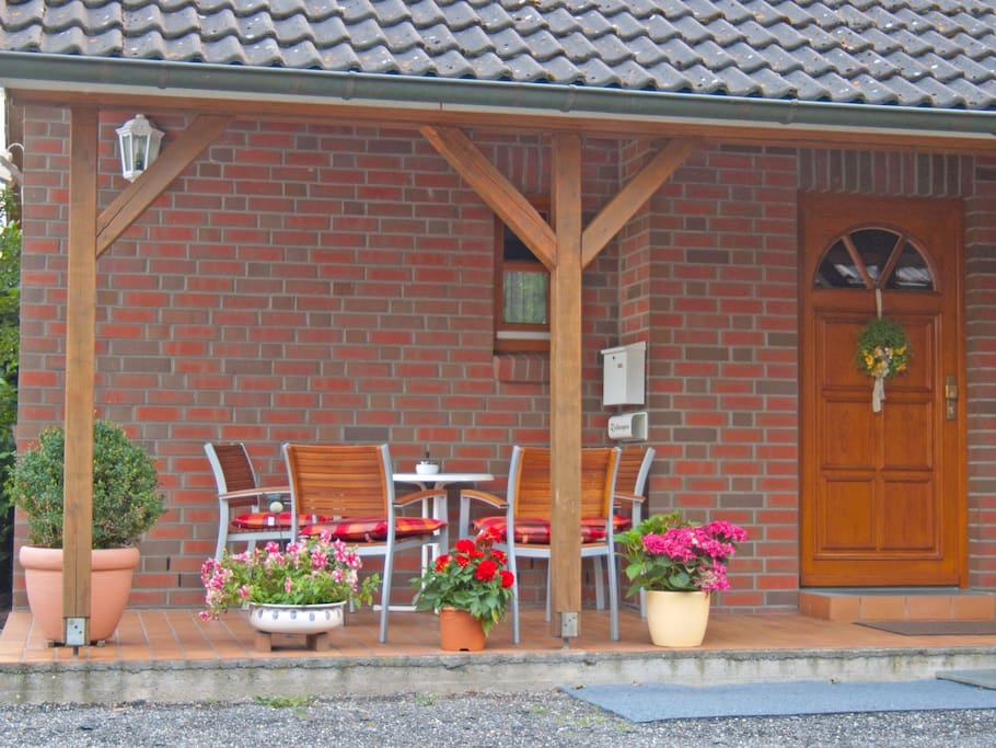 Veranda mit Sitzgelegenheit