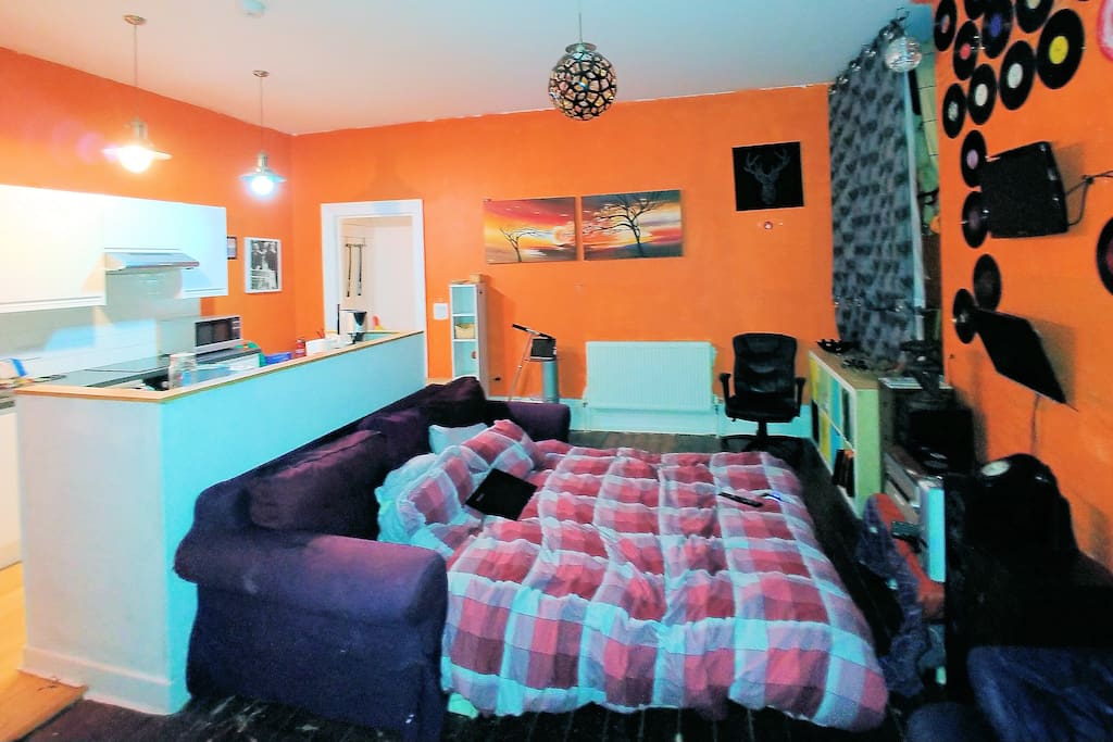 Open plan lounge area with Large Sofabed