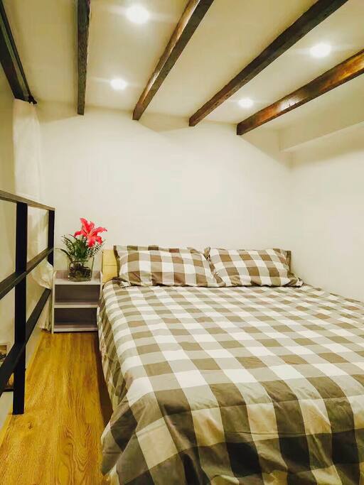 Queen size comfy bed on the second floor
