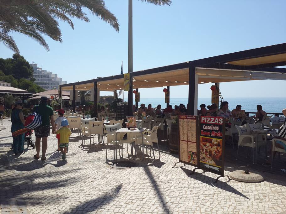 Praia da Oura - people relaxing in summer of 2016