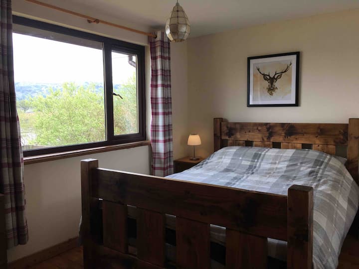 Main bedroom with king size bed  and comfy bamboo organic demko mattress for a great nights sleep after all that walking! 