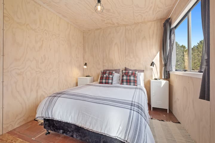 master bedroom new queen bed and lovely cotton sheeting and linen duvet cover.