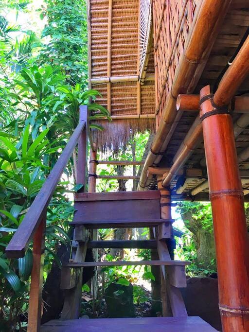 Stairs to the balcony and bedroom