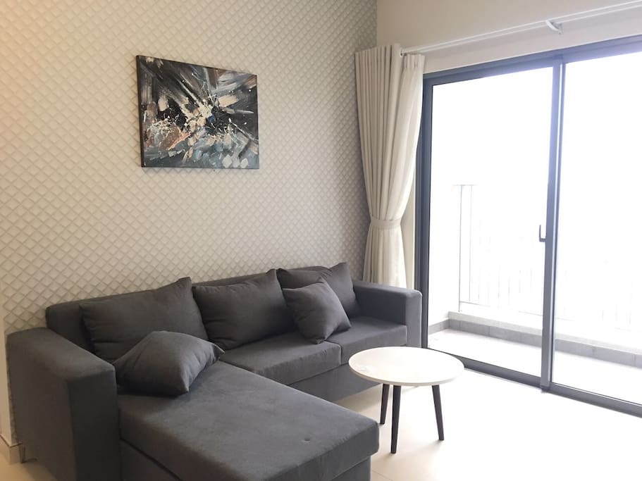 living room with balcony and view