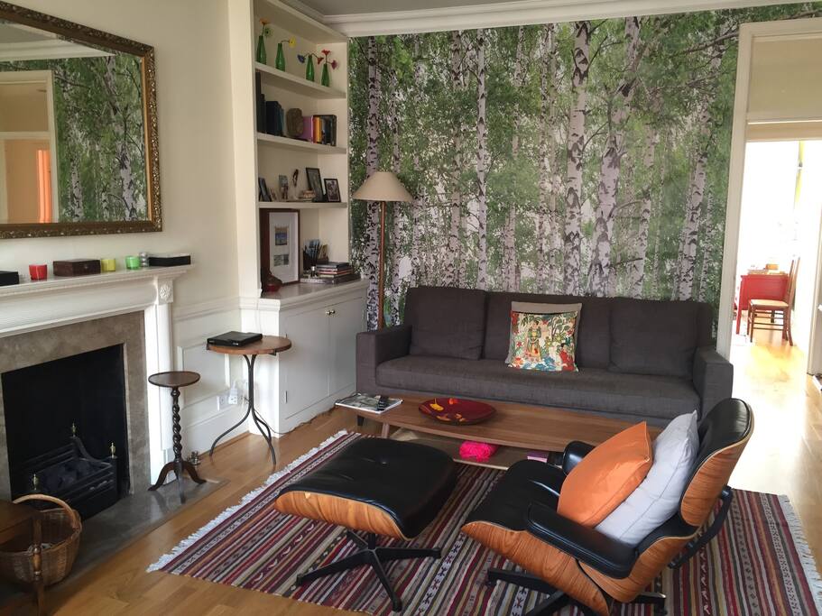 Sitting area with view of master bedroom in the background