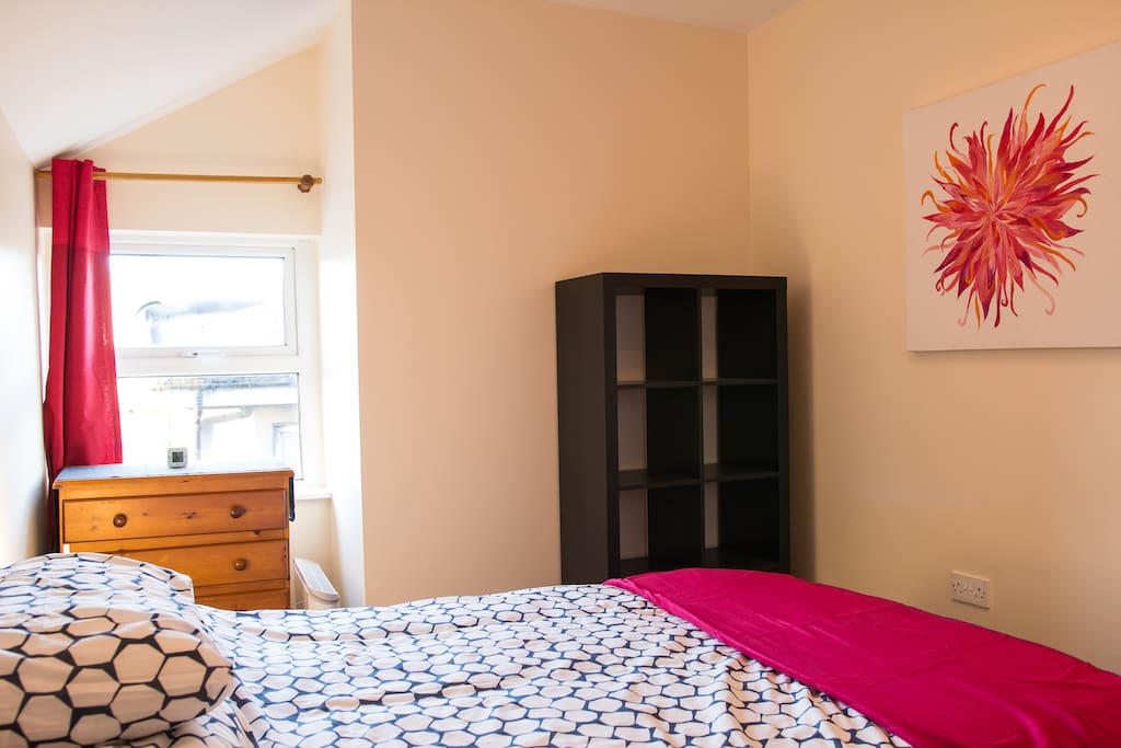 First bedroom with a double bed