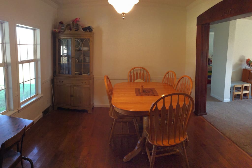 Expandable dining table with room for 12. Two children's tables. One high chair and two booster seats available upon request.