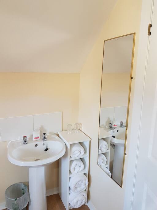 The wash area is clean and freshly updated.