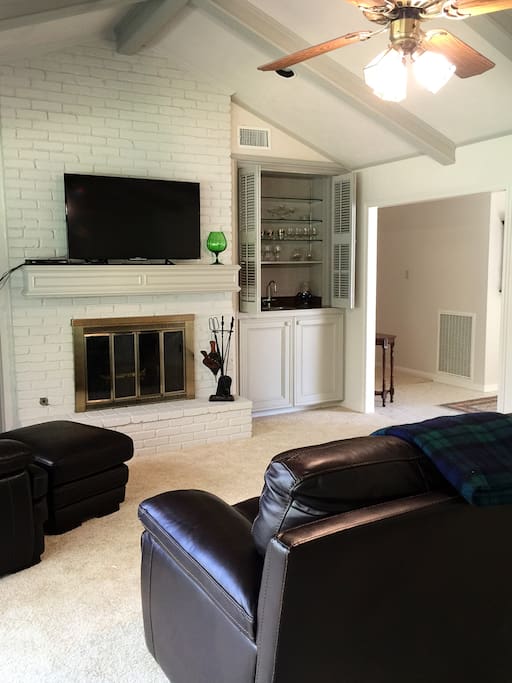 Fireplace and wet bar in the den too.