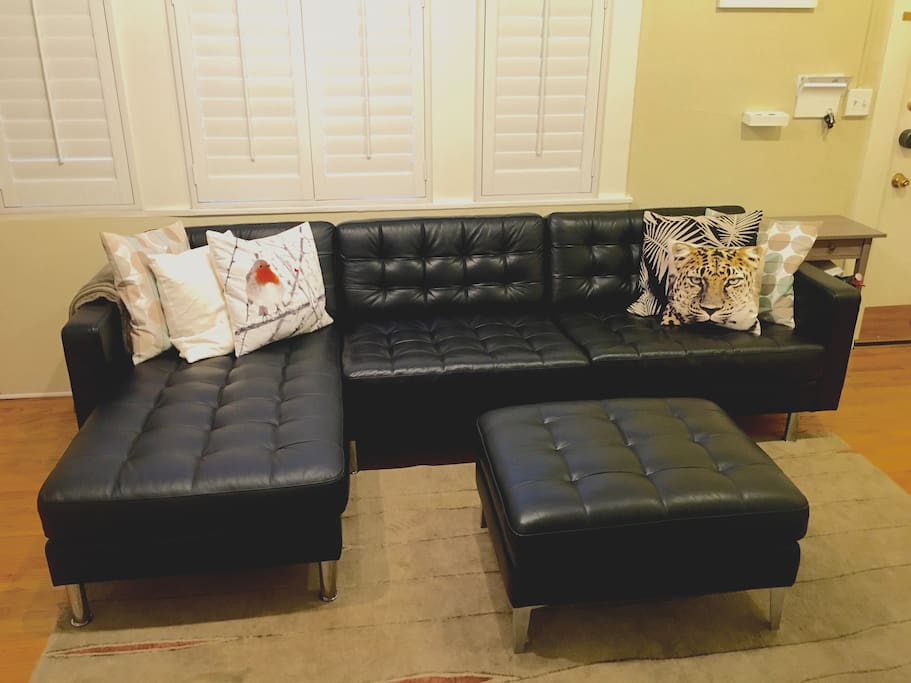 Comfy leather sofa with chaise and ottoman