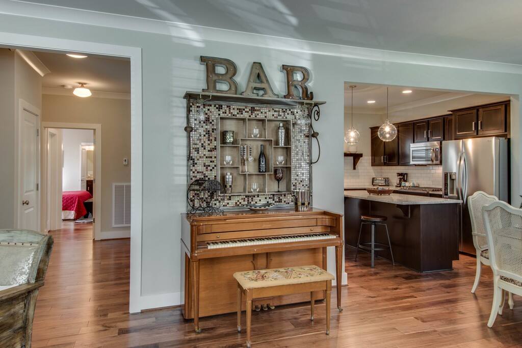 One-of-a-kind Nashville style, with hardwood floors and handmade/refinished furniture.