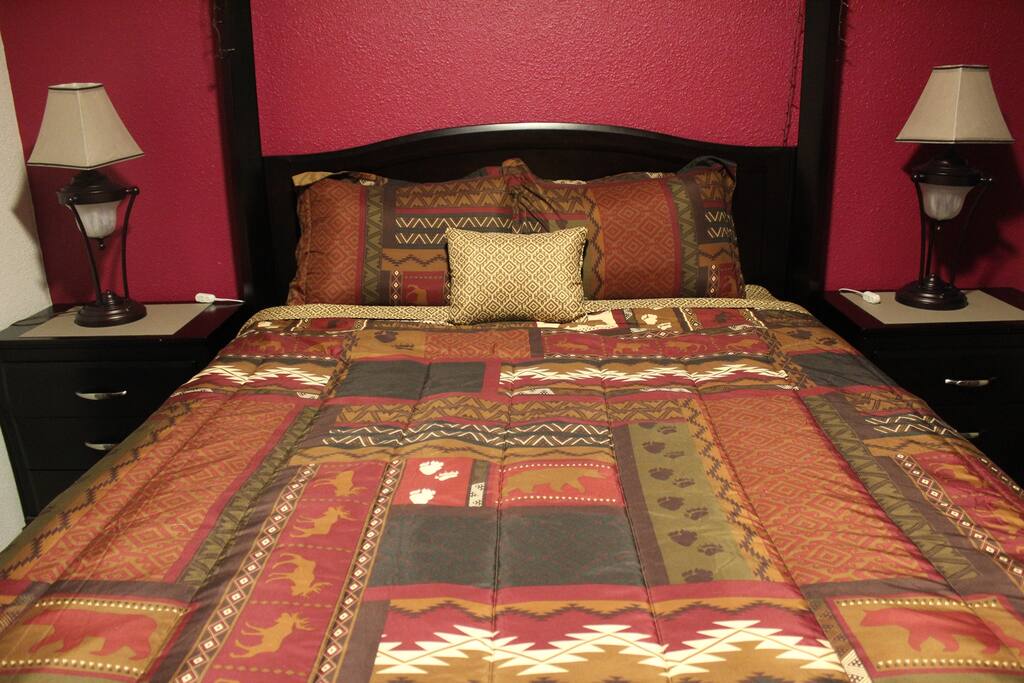 Private bedroom with a queen size bed