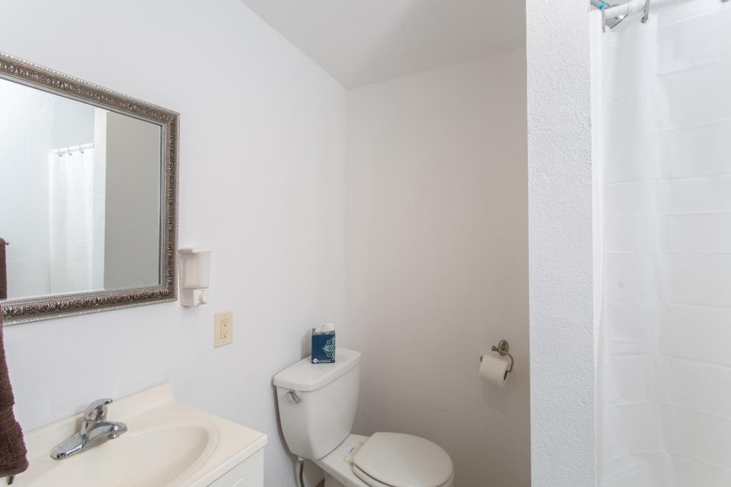 Bath with walk-in shower, towels,space heater