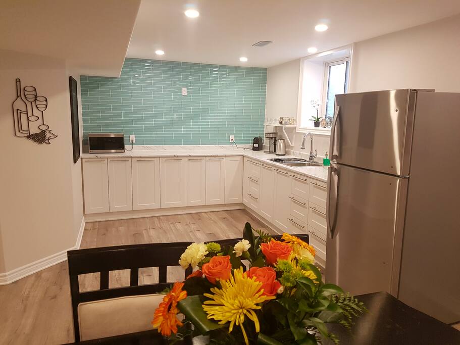 Kitchenette boasts full size fridge, microwave, coffee, tea, espresso, and some snacks.