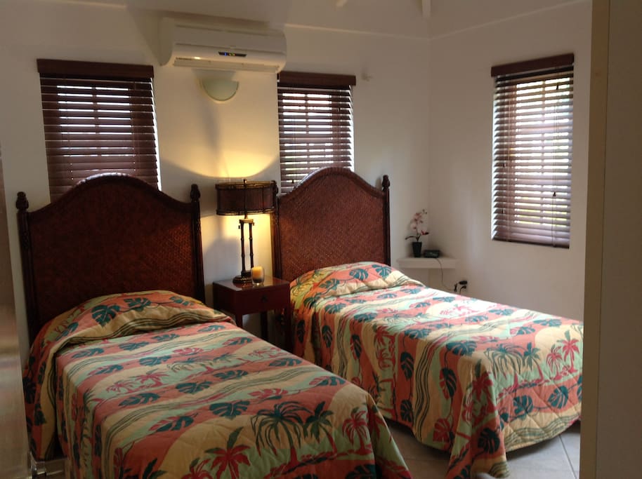 Twin room that converts to King size bed with room darkening shades, private ensuite