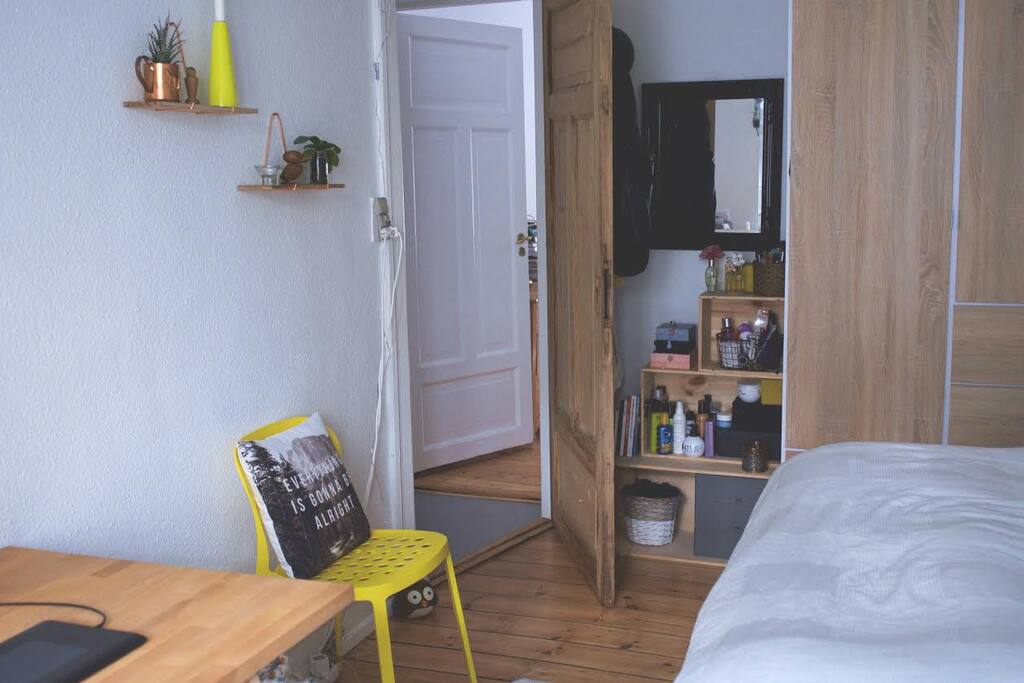 Bedroom with balcony. View to the mini hall.