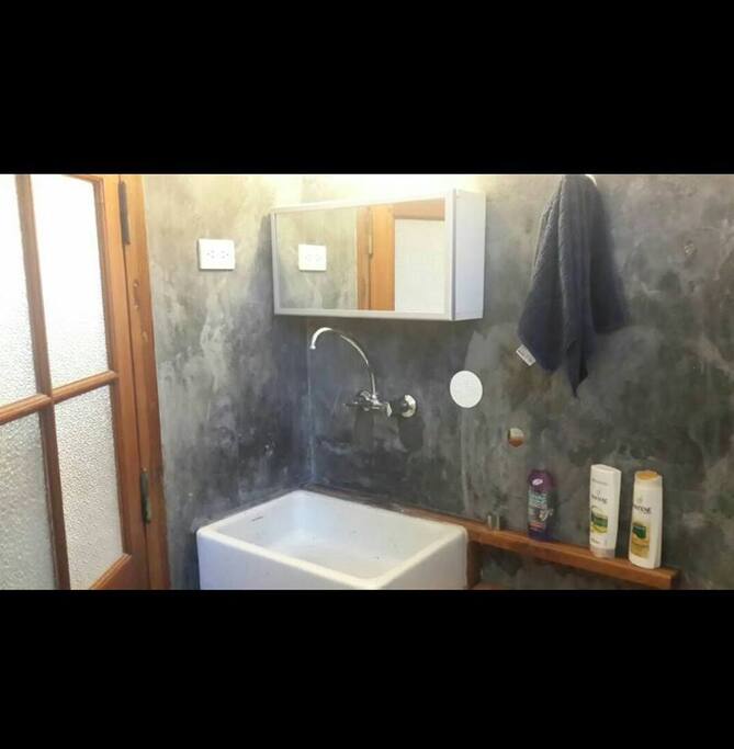 Baño realizado en cemento alisado