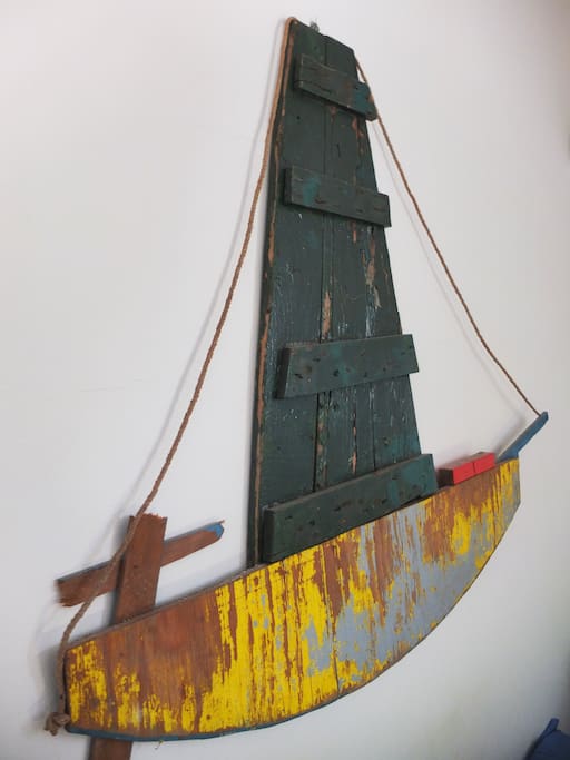 "La barca", scultura in legno