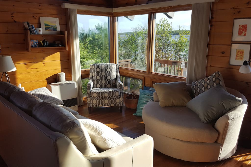 Main floor living space with brand new sofa bed