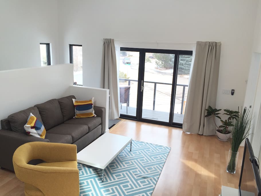 Living room with access to your private deck.