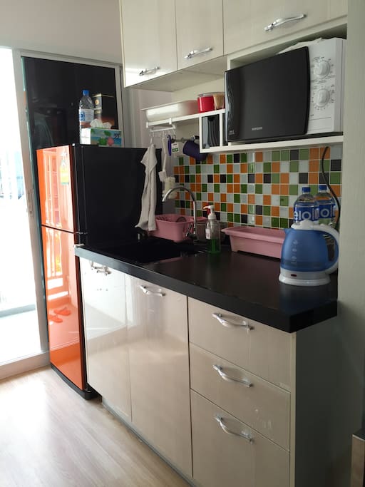 Kitchen with microwave fridge