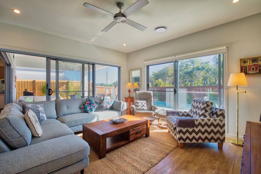 Lounge area with alfresco and pool beyond