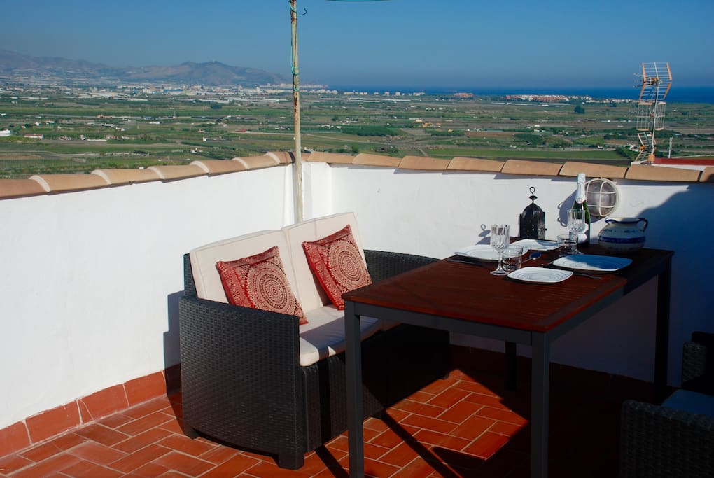 Casa Estrella has a spacious roof terrace with amazing views of the sea, mountains, castle and church