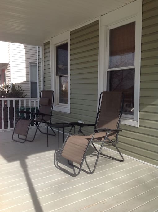 Relaxing front porch, with views and sounds of the park.