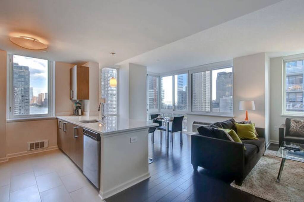 Fully equipped kitchen with full size stainless steel appliances, pots, pans and dishes